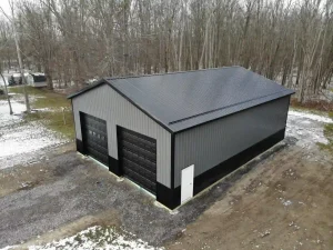 Black and grey pole barn garage by Stately Post Frame in Clarence, NY.