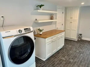 Laundry room remodel in a historic Buffalo home by Stately Kitchen and Bath.