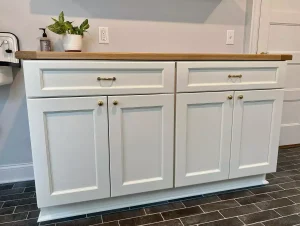 Laundry room remodel in a historic Buffalo home by Stately Kitchen and Bath.