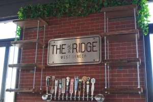 Custom carpentry for The Ridge brewery in West Seneca, NY by Stately Builders.