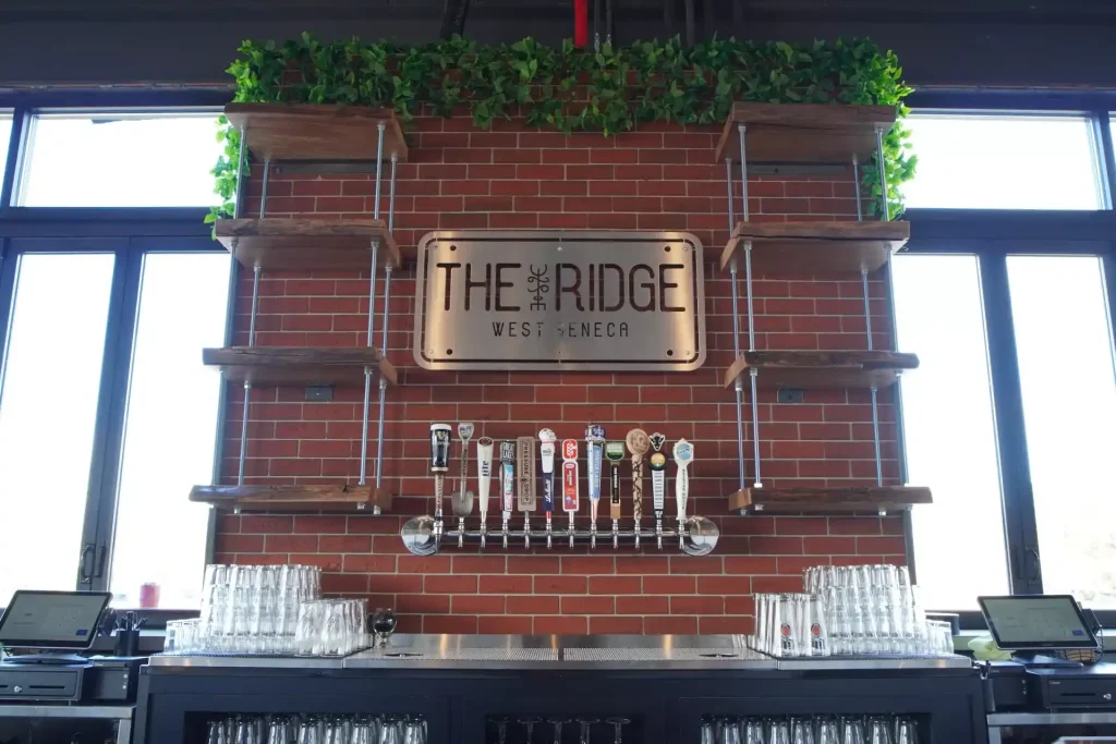 Custom carpentry for The Ridge brewery in West Seneca, NY by Stately Builders.