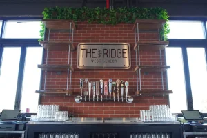 Custom carpentry for The Ridge brewery in West Seneca, NY by Stately Builders.