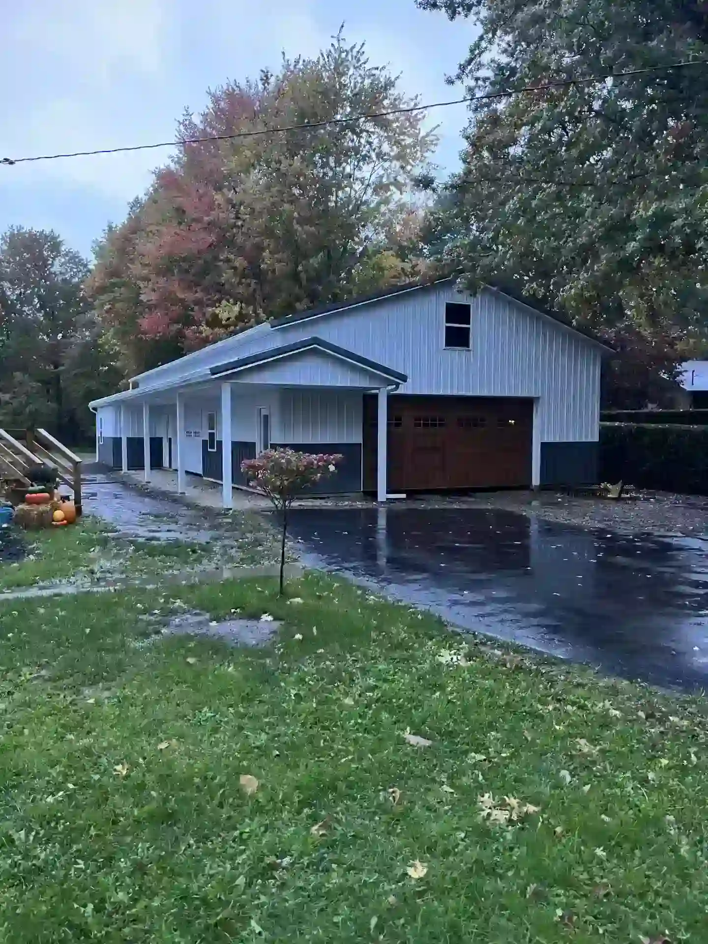 Large pole barn garage with lean-to by Stately Post Frame in Clarence Center, NY.