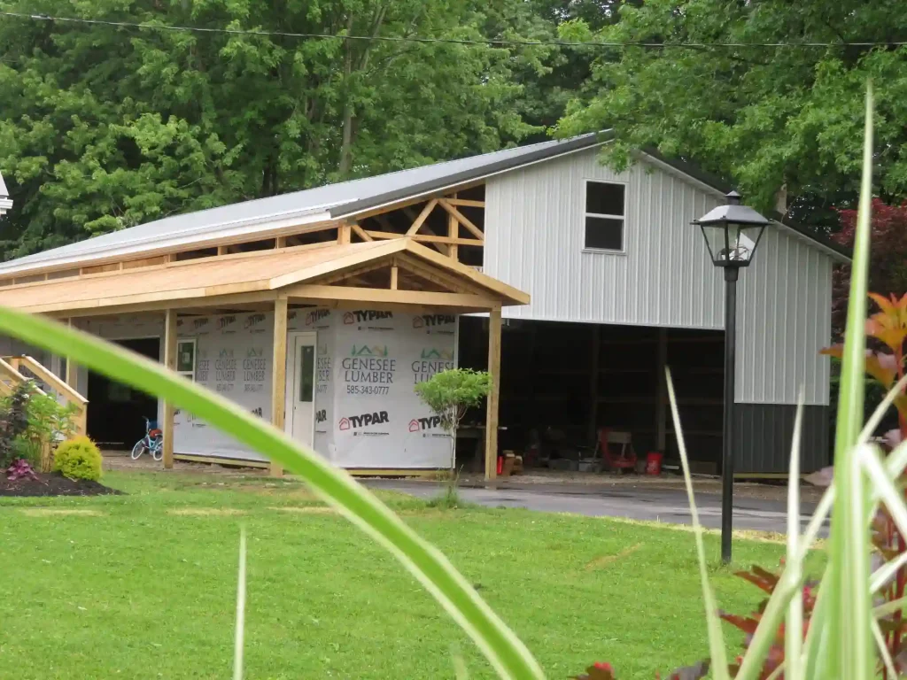 Large pole barn garage with lean-to by Stately Post Frame in Clarence Center, NY.