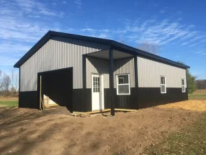 Pole barn garage with small lean-to by Stately Post Frame in Akron, NY.