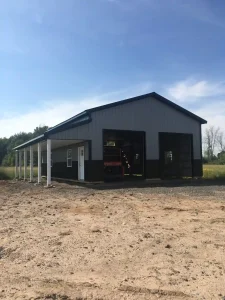 Residential pole barn garage with lean-to by Stately Post Frame in Clarence Center, NY.