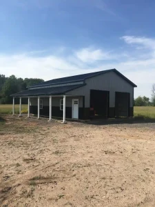 Residential pole barn garage with lean-to by Stately Post Frame in Clarence Center, NY.
