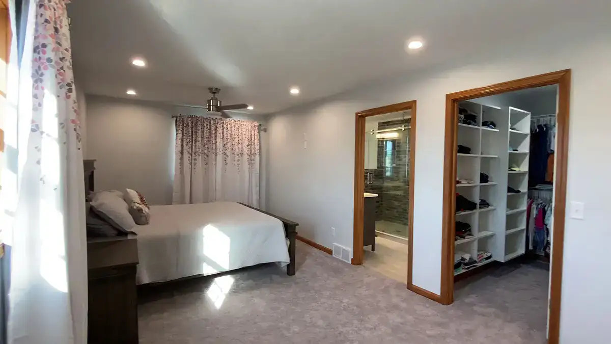 Master bedroom, ensuite bathroom, and walk-in closet addition by Stately General Contracting in Williamsville, NY.