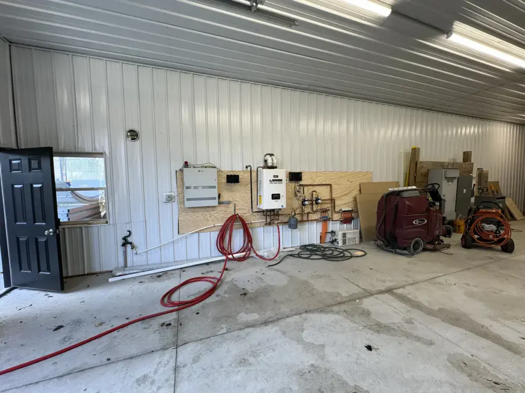 Zamboni Ice Resurfacer Maintenance Building at The Classic Rink in East Aurora, NY by Stately Pole Barns.