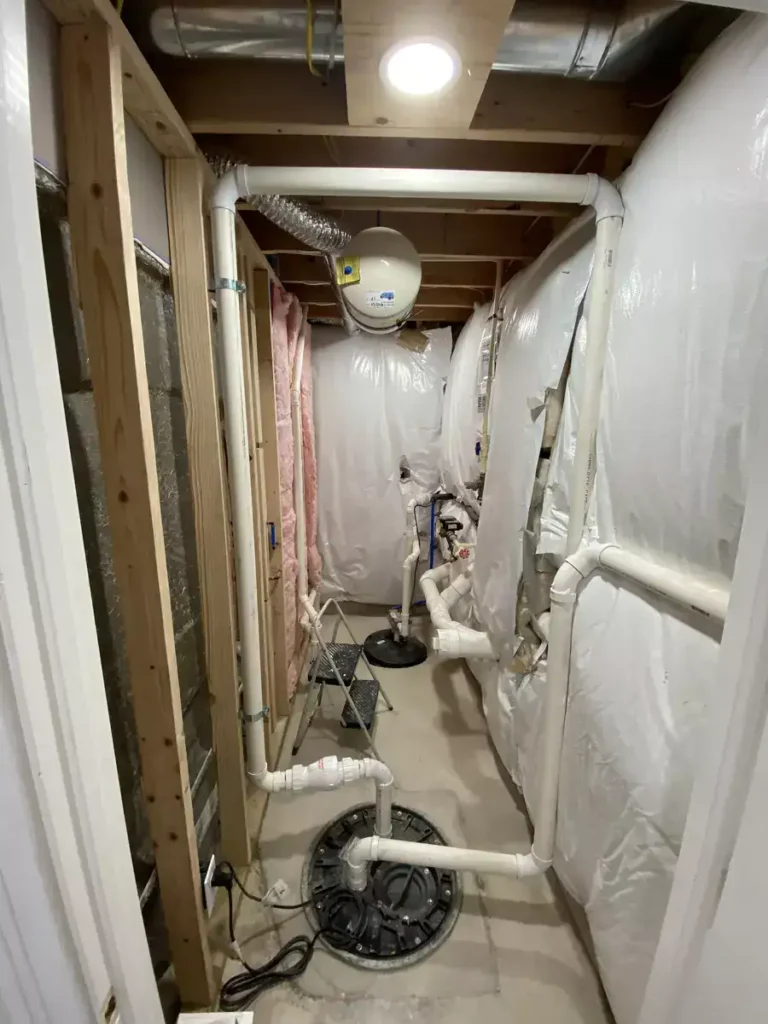 Basement plumbing solution by Merkel Plumbing in Clarence Center, NY.