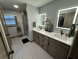 Second-story addition in West Seneca, NY by Stately General Construction. Remodeled master bathroom.