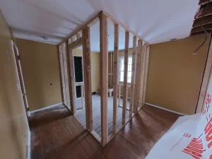 Framed walls and ceiling of the primary bedroom addition by Stately General Contracting in Clarence, NY, during construction.