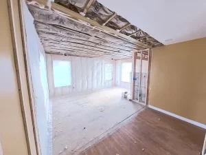 View from existing home structure looking into primary bedroom addition under construction in Clarence, NY.