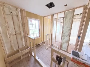 Framing and insulation work in progress for primary bathroom in Clarence, NY home addition.