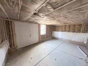 Insulated basement extension in progress during a home addition in Clarence, NY.