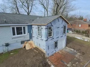 Exterior view of new home addition with Typar house wrap and Genesee Lumber materials in Clarence, NY.