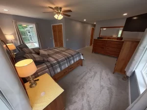 Stately General Contracting completed primary bedroom suite addition in Clarence, NY, highlighting the modern design and cozy ambiance.