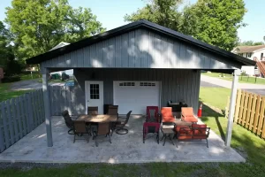 Overhead shot of a post-frame building in Clarence, NY, with a 24x36x10 dimension, highlighting the pavilion and outdoor seating area.