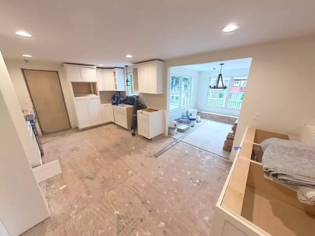 Kitchen nearing completion in Amherst, NY home addition by Stately, showcasing newly installed cabinets and spacious design.