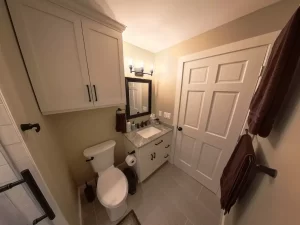 Modern bathroom vanity with granite countertop and custom cabinetry, designed by Stately Kitchen and Bath in Clarence, NY