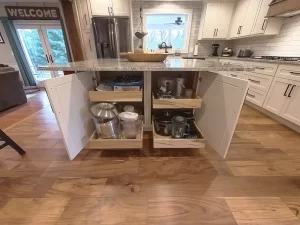 Large storage integrated into kitchen island. Part of a remodel by Stately Kitchen and Bath in Clarence, NY.
