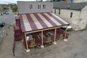 Wood framing and support posts for Ballyhoo Buffalo’s covered deck installed by Stately Pole Barns.