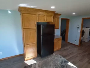 Spacious kitchen remodel by Stately, featuring expanded fridge space and upgraded luxury finishes.