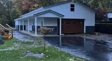 Large pole barn garage with lean-to by Stately Post Frame in Clarence Center, NY.