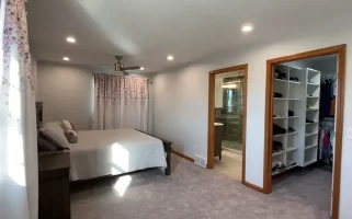 Master bedroom, ensuite bathroom, and walk-in closet addition by Stately General Contracting in Williamsville, NY.