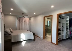 Master bedroom, ensuite bathroom, and walk-in closet addition by Stately General Contracting in Williamsville, NY.