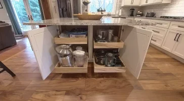 Large storage integrated into kitchen island. Part of a remodel by Stately Kitchen and Bath in Clarence, NY.